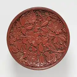 Carved lacquer tray with roses, Yuan dynasty, 16 cm across